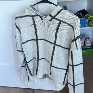 Hooded black and white sweater